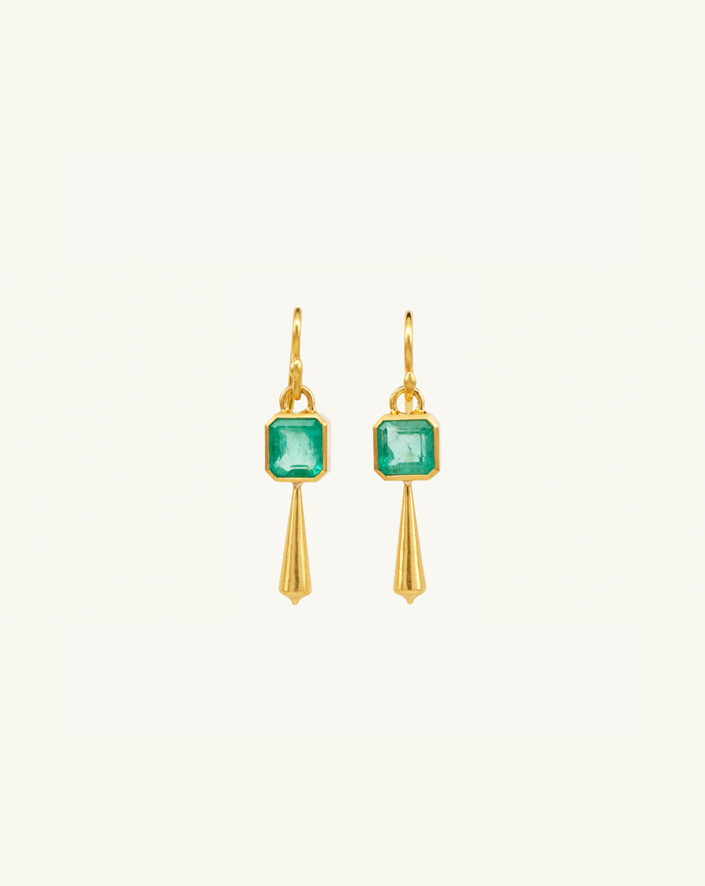 Product image of the tapered drop earrings with two large square emerald gemstones