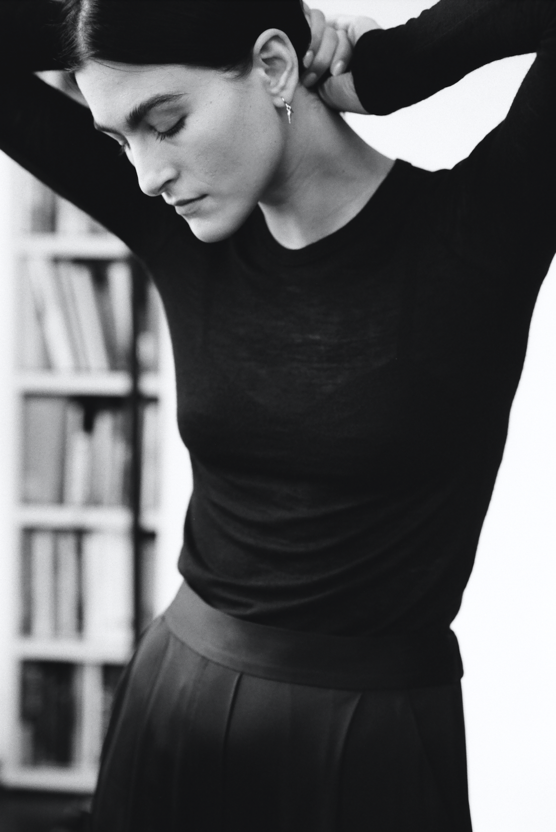 Model wears i seira pod drop earrings in collaboration with brand, frances de lourdes