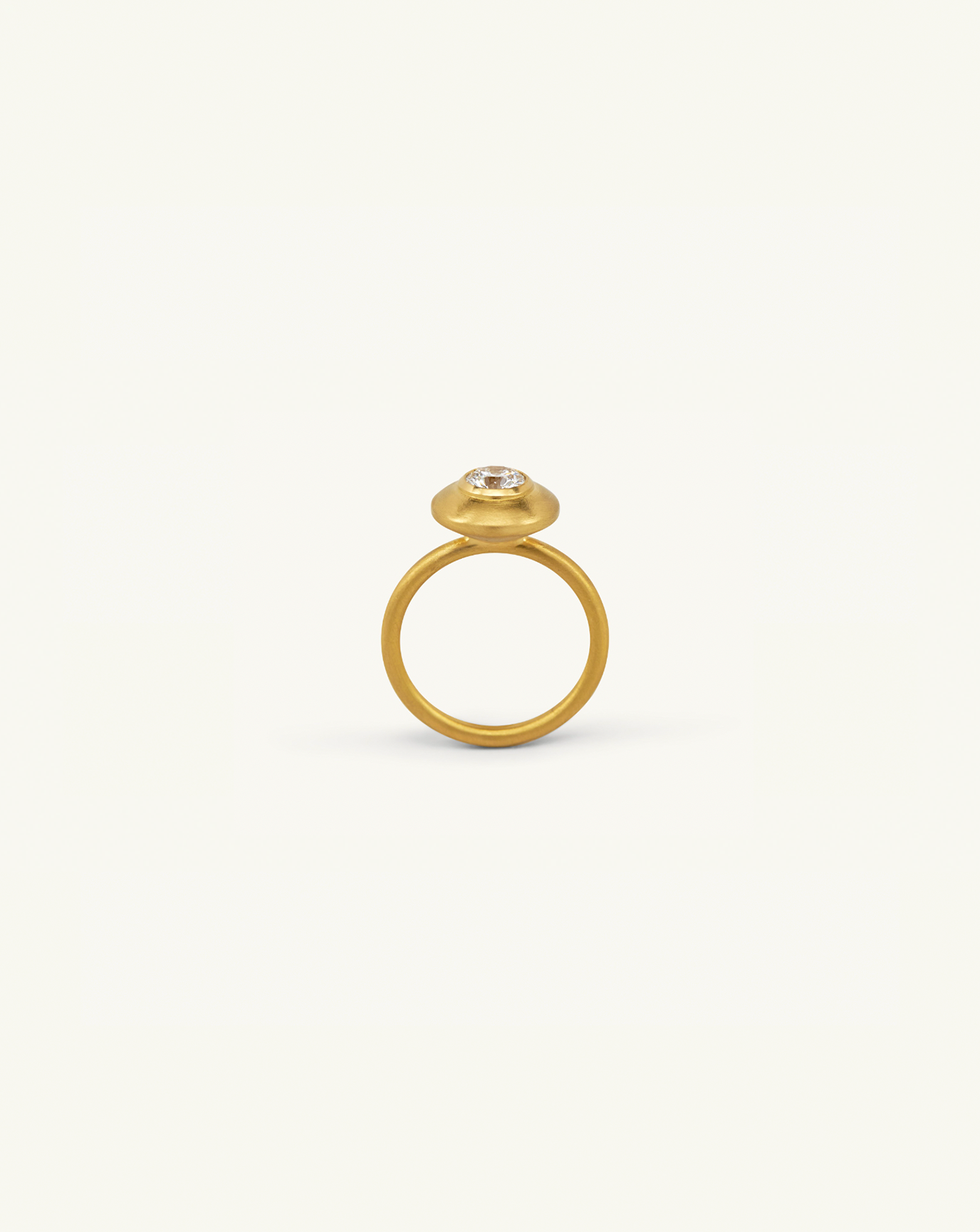 Product image of the gold pod ring with white diamond