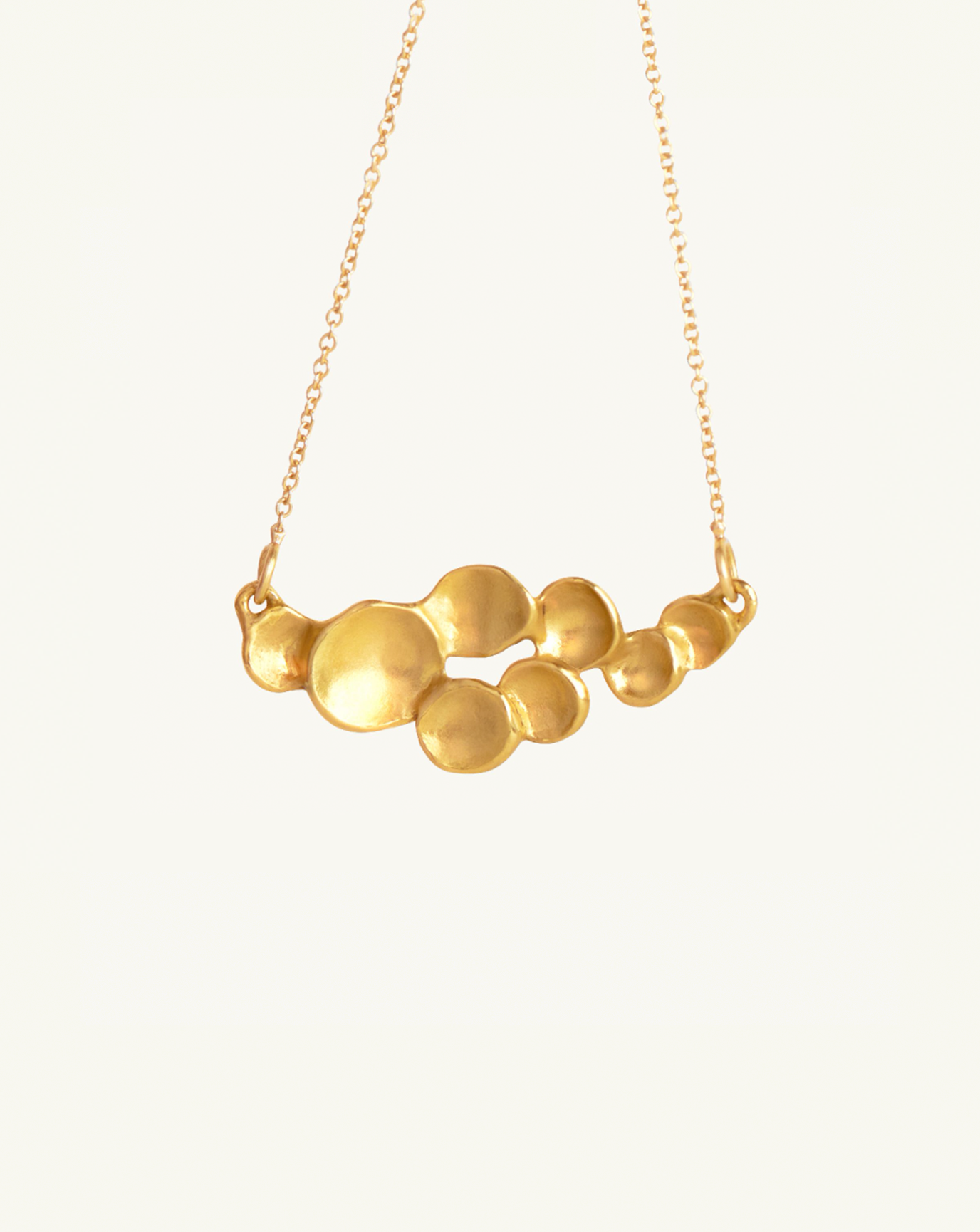 Product image of the abstract sculptural necklace in gold