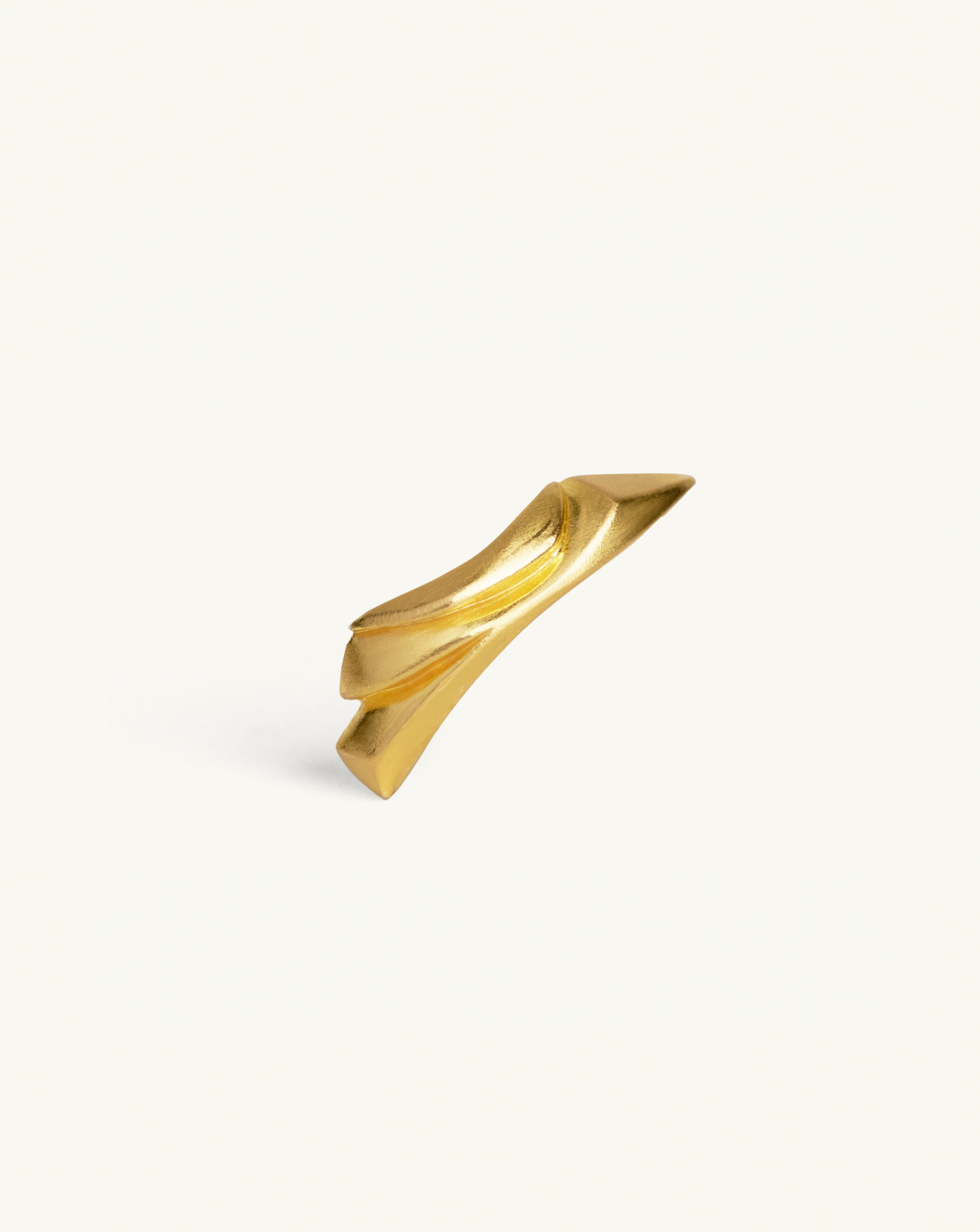Product image of the sculptural pin in gold