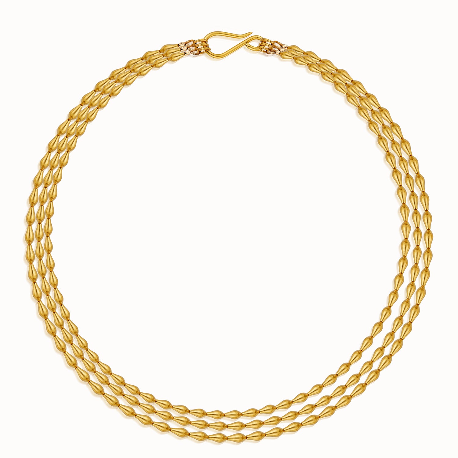 Product image of layered gold pod necklace