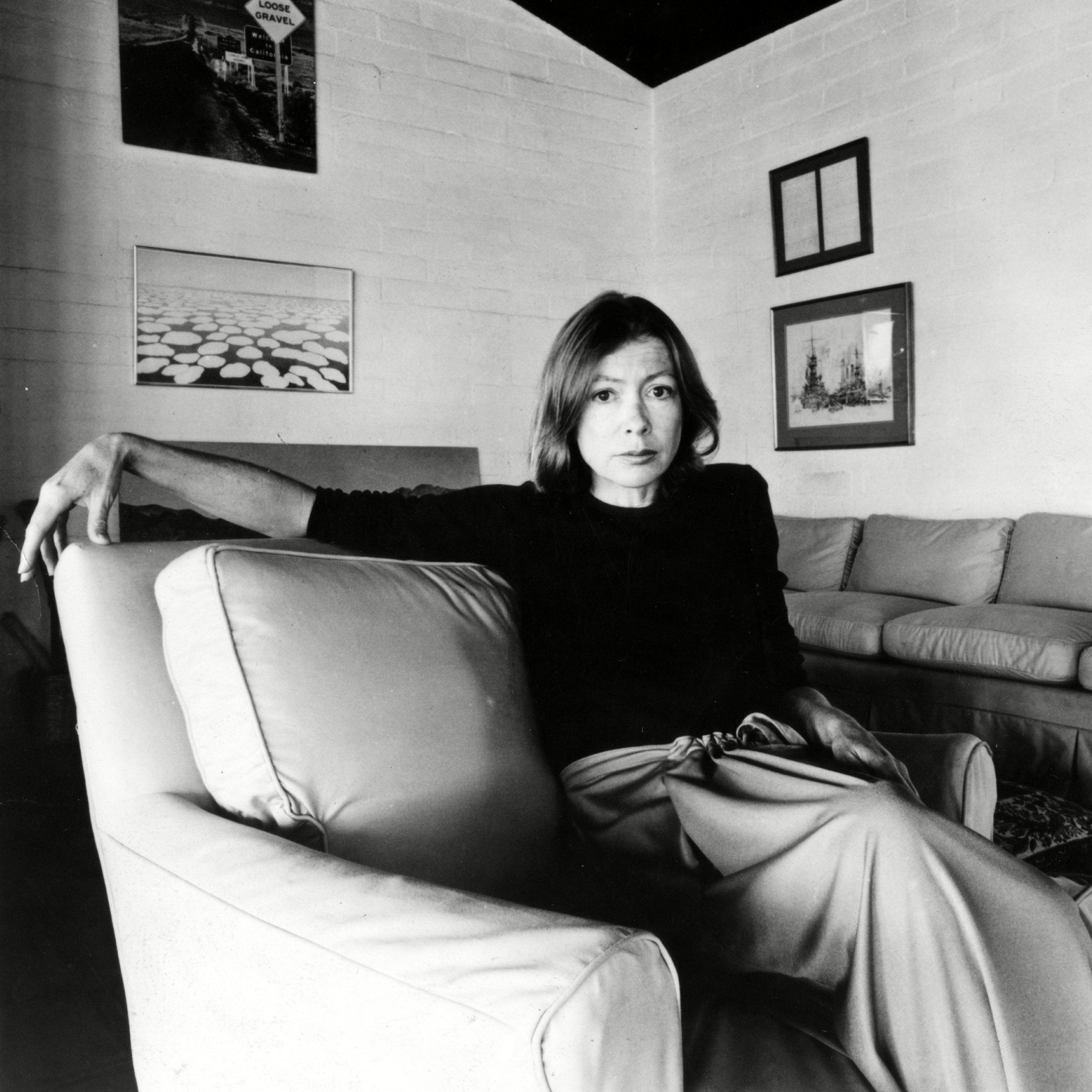Reference black and white image of Joan Didion sitting