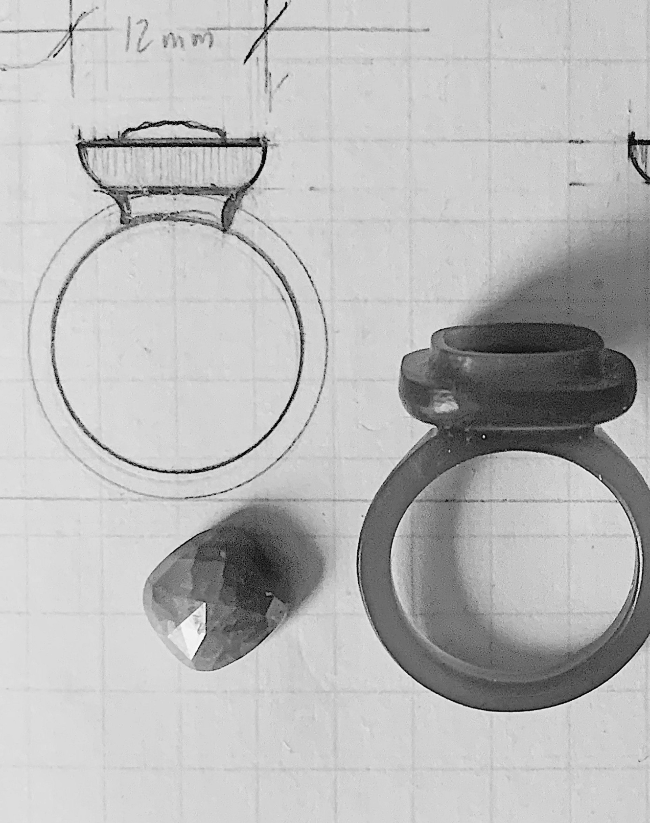 Black and white image of the i seira wax carving process to create the statement ring