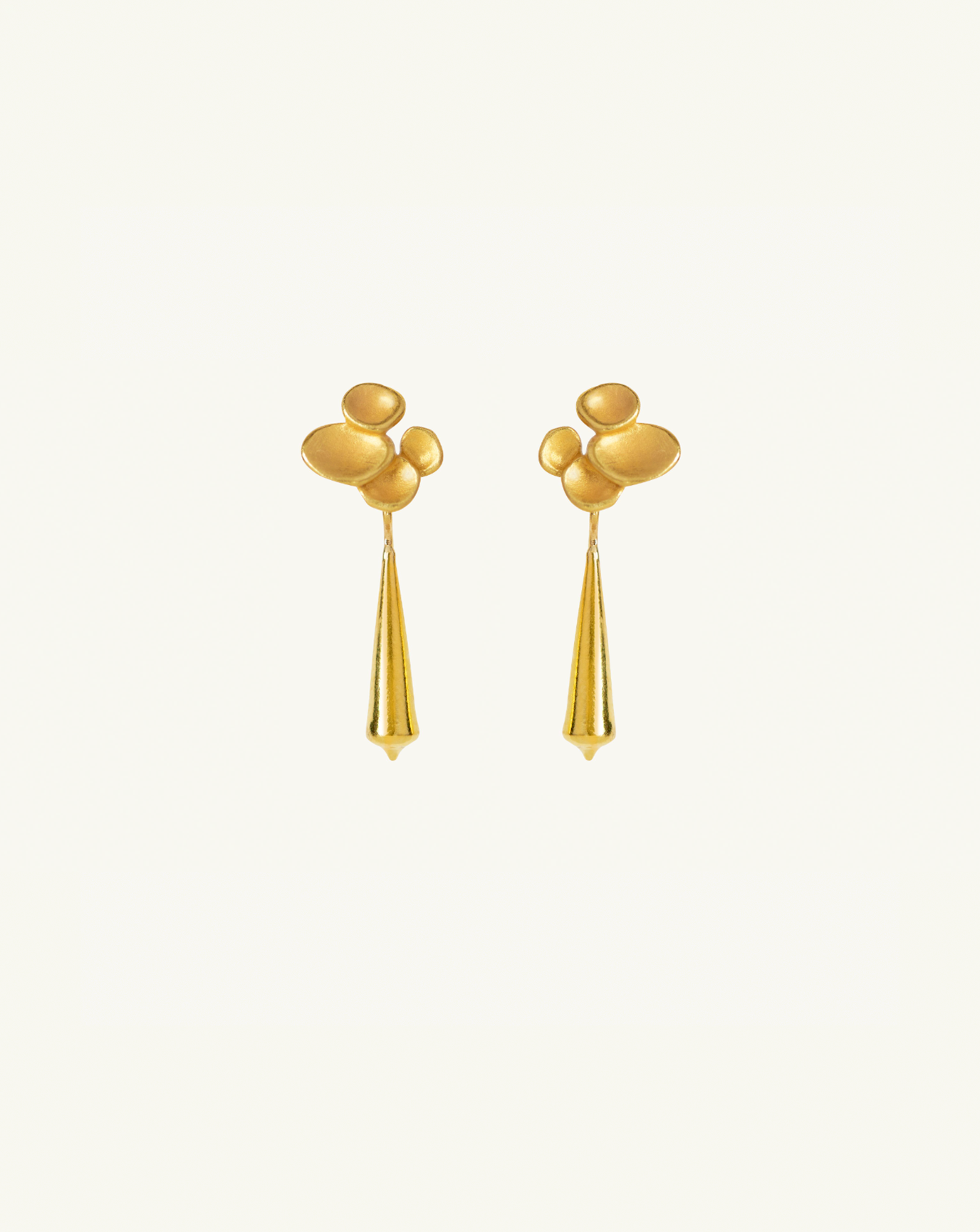Product image of the tapered gold pod earrings with abstract climber studs attached